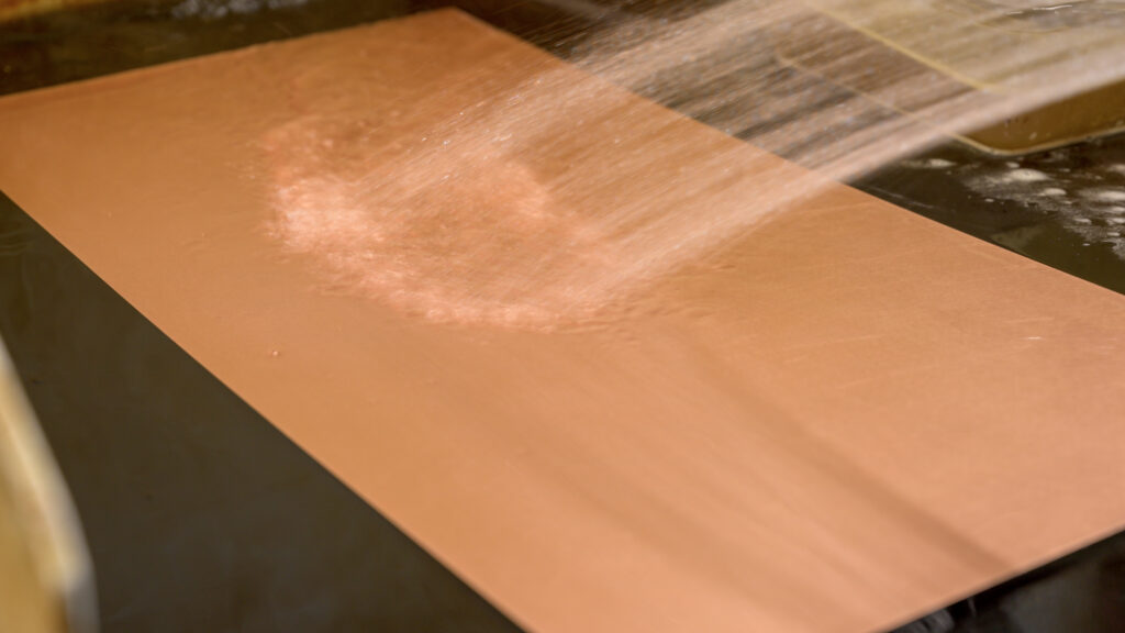 water splash on metal sheet