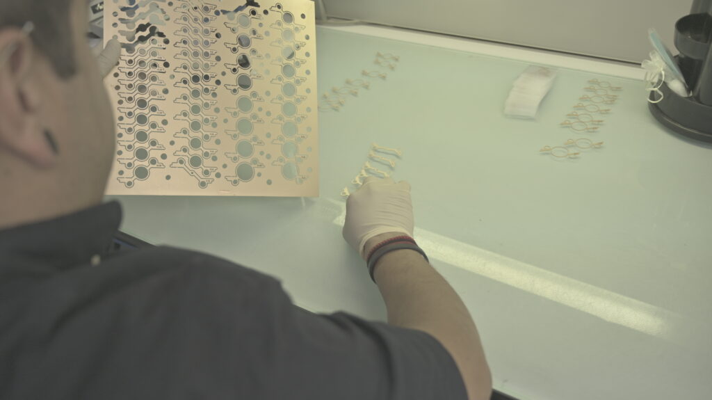 worker with thin metal parts
